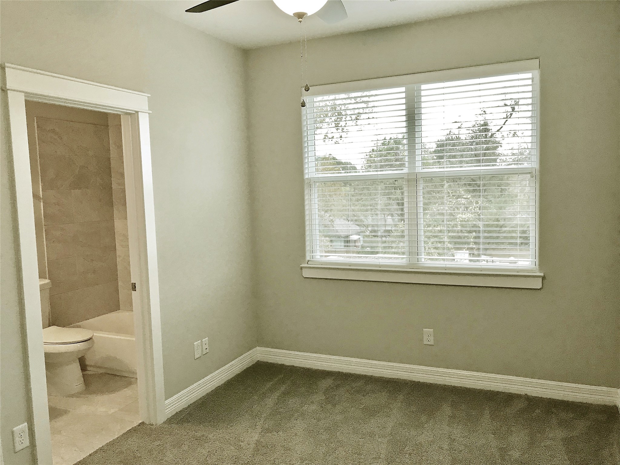 709 Link Road Houston, TX 77009 - Photo 33 of 46 a view of an empty room with toilet and a window