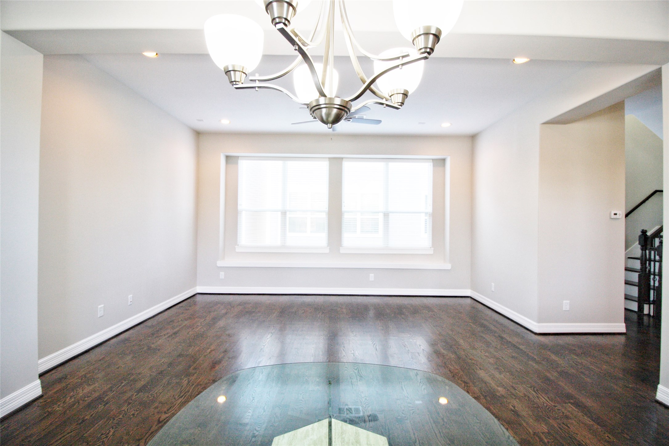 709 Link Road Houston, TX 77009 - Photo 6 of 41 WE HAVE THIS SET UP AS A FULL DINING ROOM BUT BUYER CAN HAVE THE FIXTURE REPLACED WITH A CEILING FAN TO CREATE A HUGE LIVING FLEX ARRANGEMENT