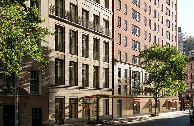 a view of a kitchen with a sink and living room