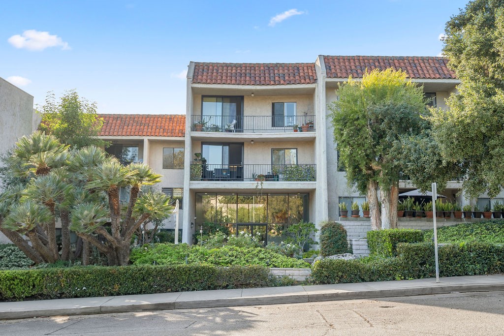 1401 Valley View Road, Unit 332 Glendale, CA 91202 - Photo 1 of 1 a front view of a house with plants and trees