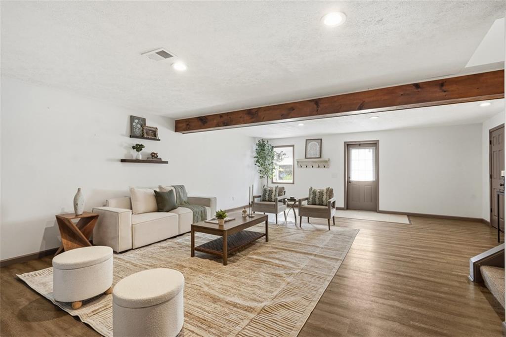 8517 Wittmer Road Pittsburgh, PA 15237 - Photo 13 of 46 a living room with furniture and wooden floor