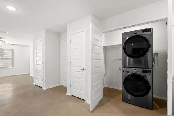a kitchen with a refrigerator stove and microwave