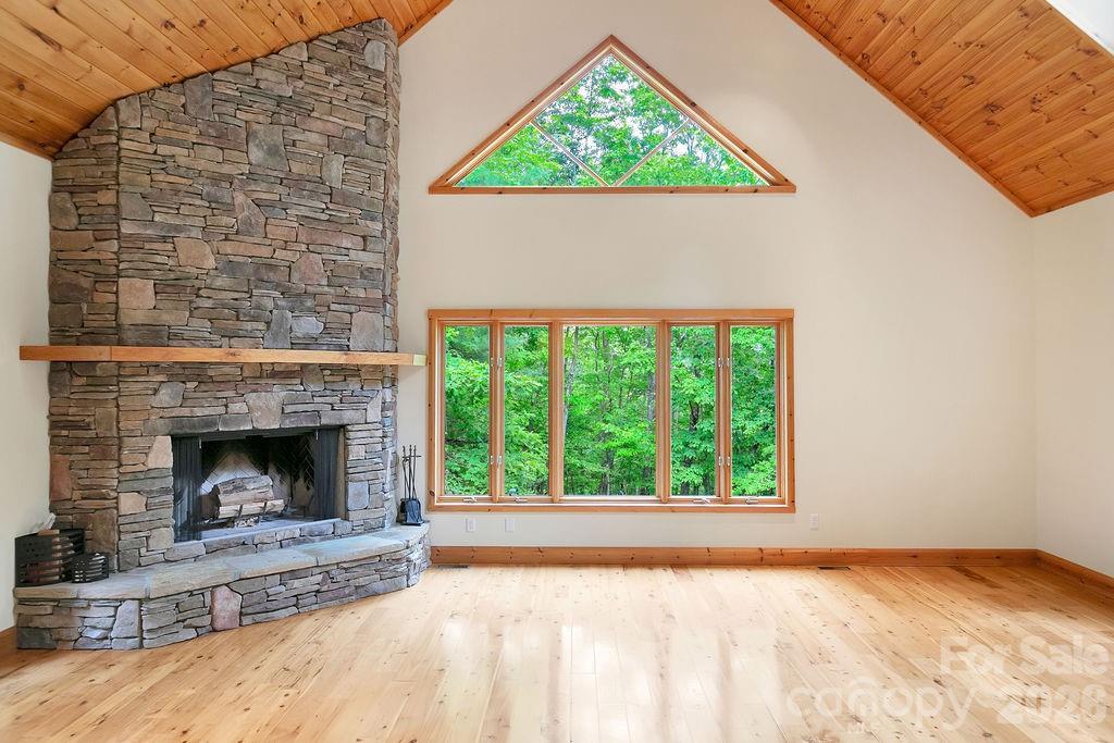 40 Walnut Ridge Road Brevard, NC 28712 - Photo 11 of 47 a view of an empty room with a fireplace and a window