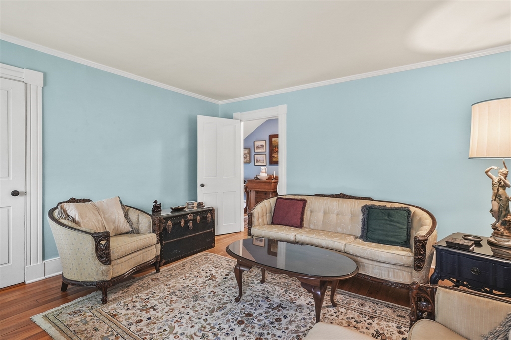 90 Common Street Barre, MA 01005 - Photo 13 of 27 a living room with furniture and a rug