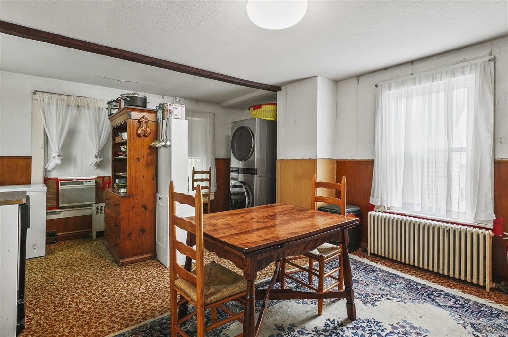 90 Common Street Barre, MA 01005 - Photo 17 of 27 a view of a dining room with furniture and window
