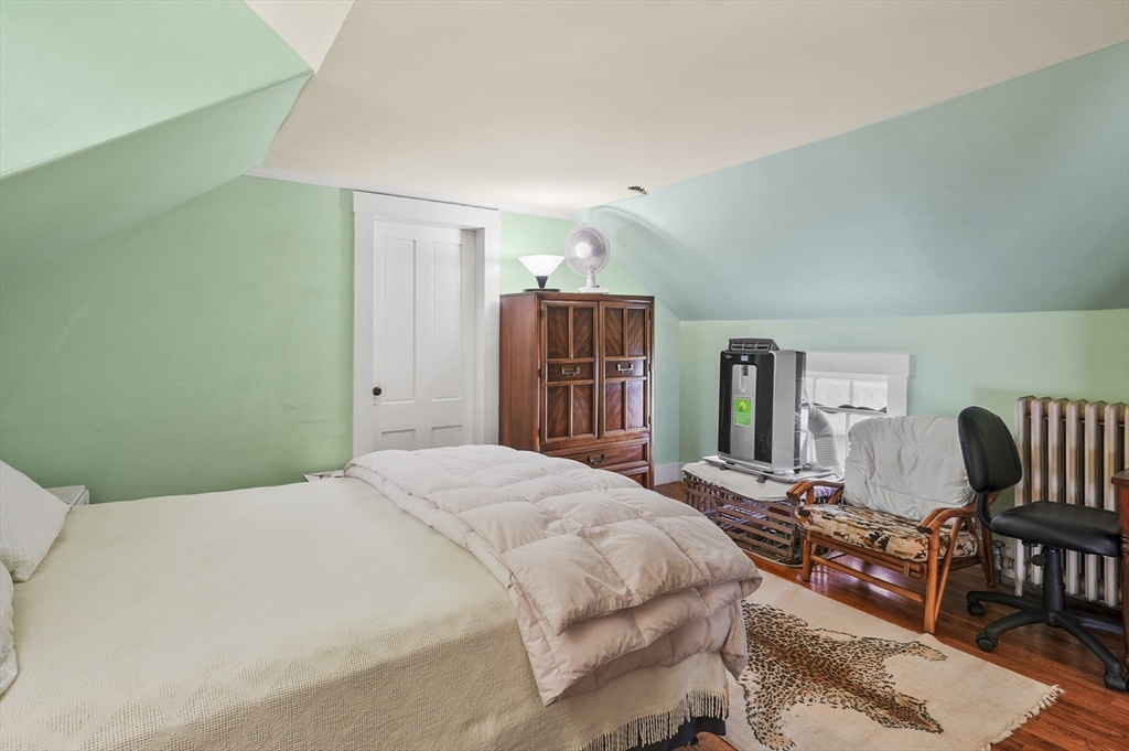 90 Common Street Barre, MA 01005 - Photo 19 of 27 a bedroom with a bed a dresser and chair