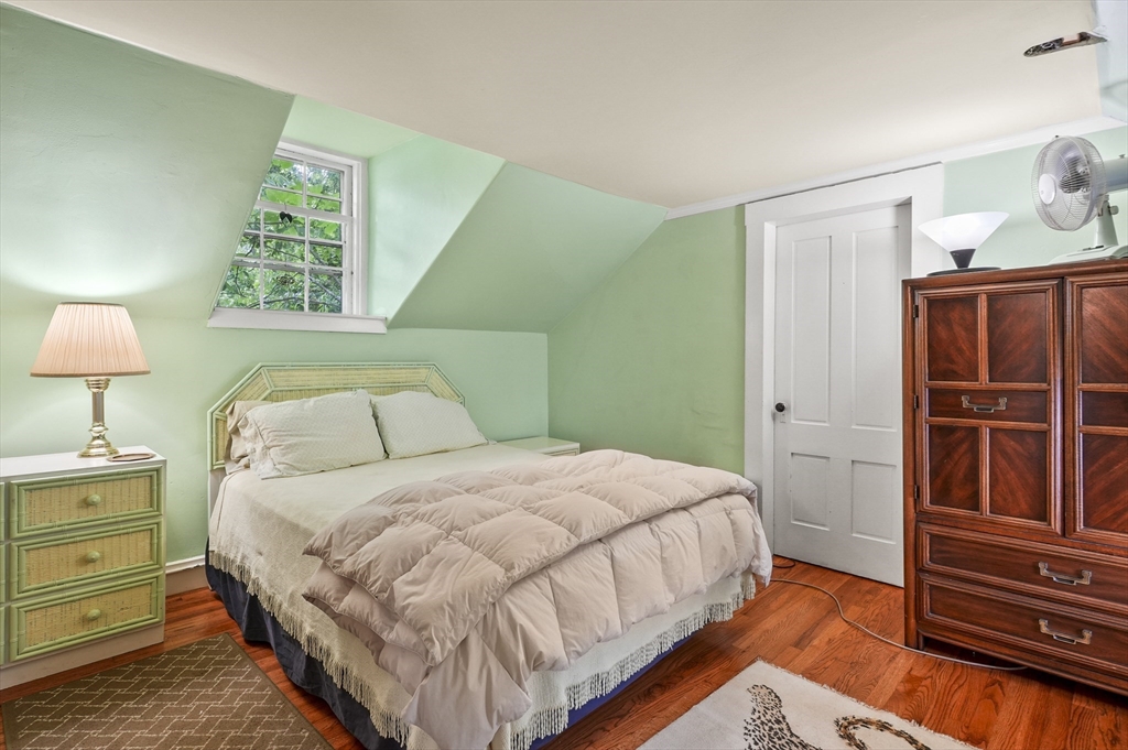 90 Common Street Barre, MA 01005 - Photo 21 of 27 a bedroom with a bed and dresser with mirror