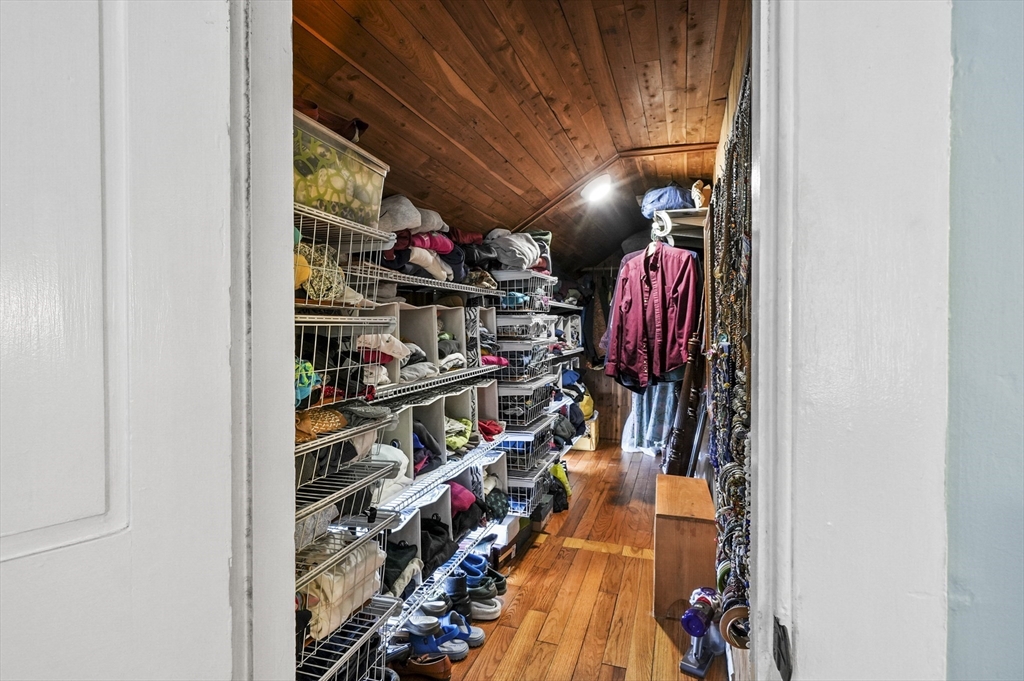 90 Common Street Barre, MA 01005 - Photo 23 of 27 a view of walk in closet with clothes and shoes