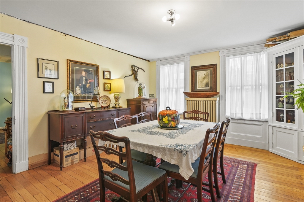90 Common Street Barre, MA 01005 - Photo 5 of 27 a view of a dining room with furniture and wooden floor