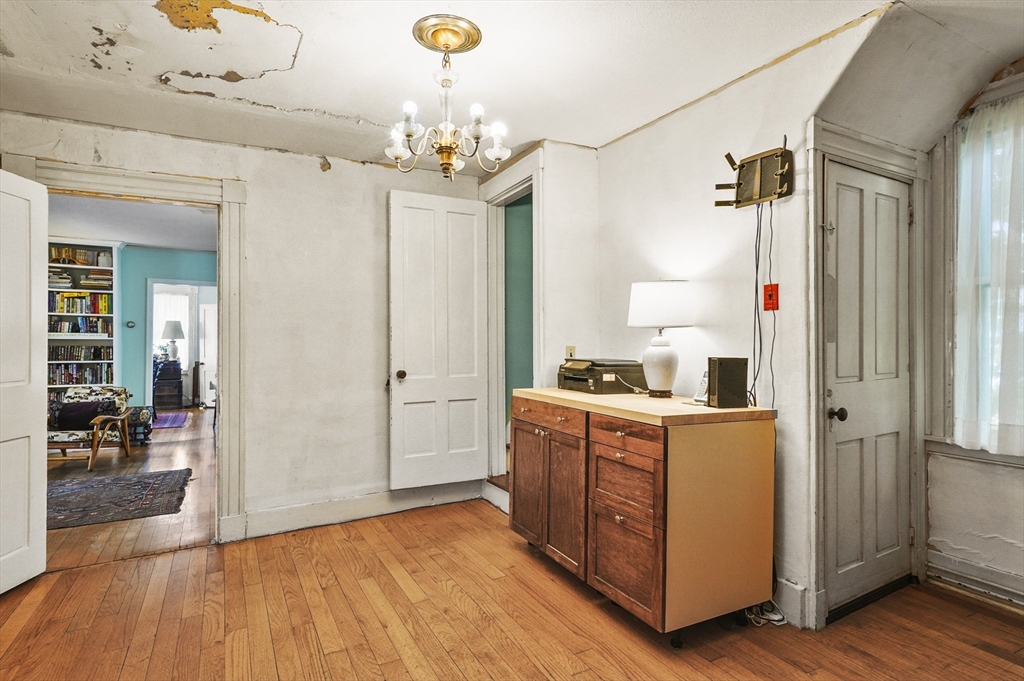 90 Common Street Barre, MA 01005 - Photo 9 of 27 a kitchen that has a lot of cabinets and wooden floor