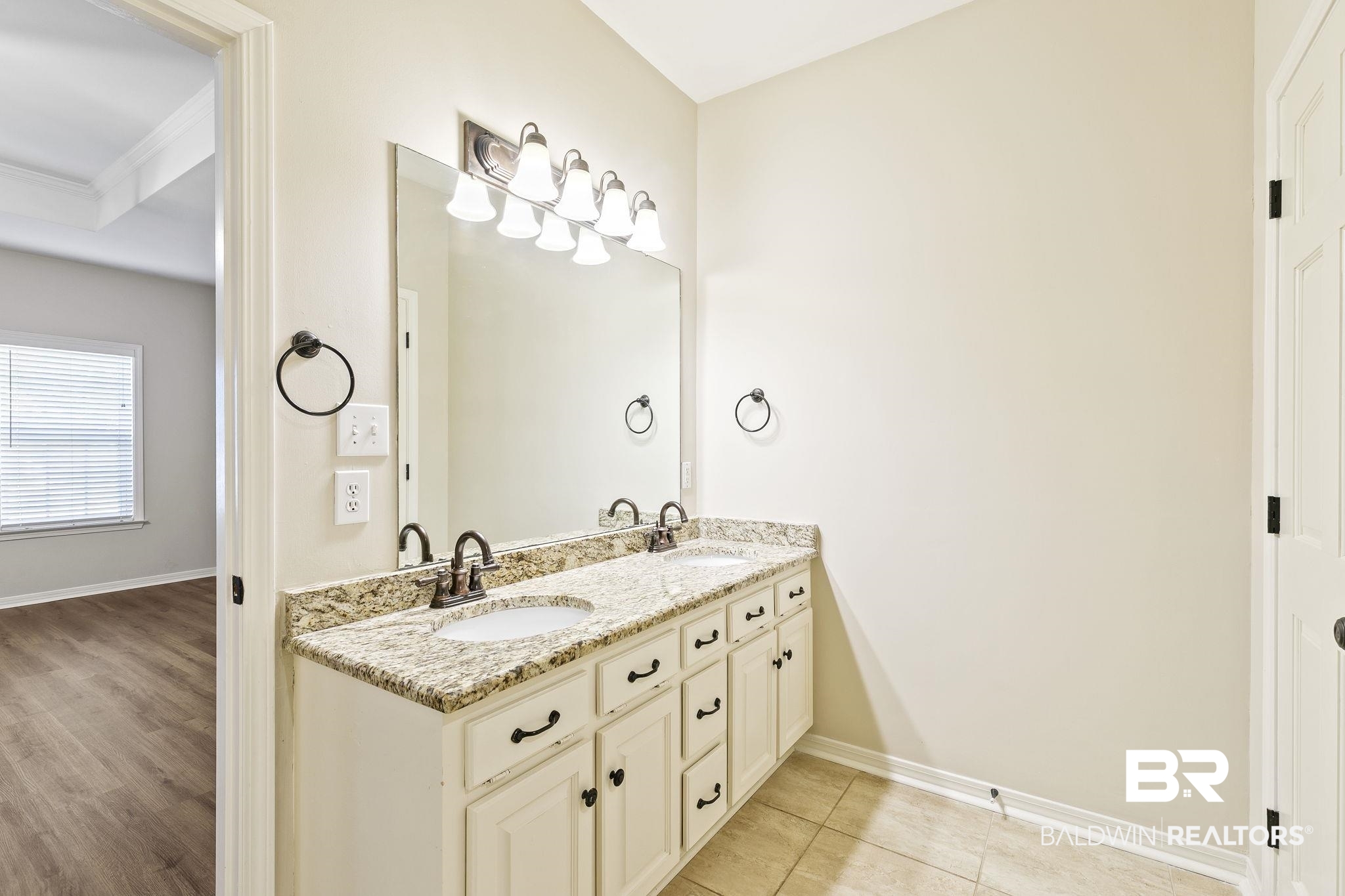 9631 Bay Meadows Avenue Fairhope, AL 36532 - Photo 21 of 49 Bathroom with vanity, ornamental molding, and hardwood / wood-style flooring