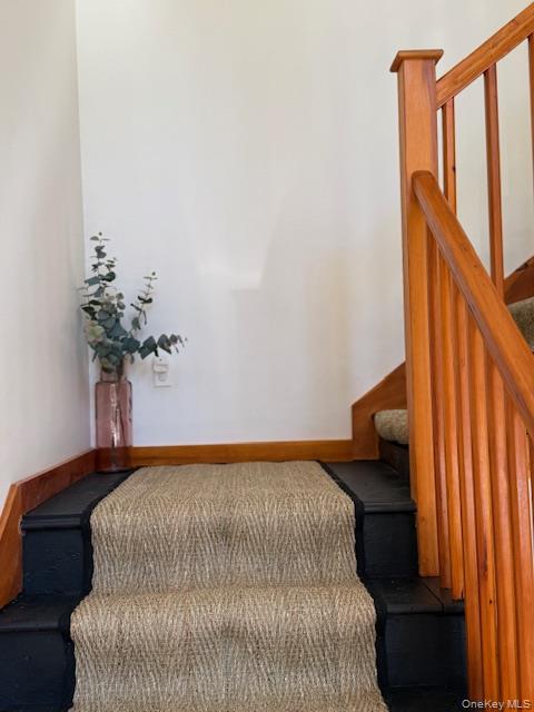 2769 State Rte 55 Bethel, NY 12786 - Photo 15 of 28 open staircase to upstairs
