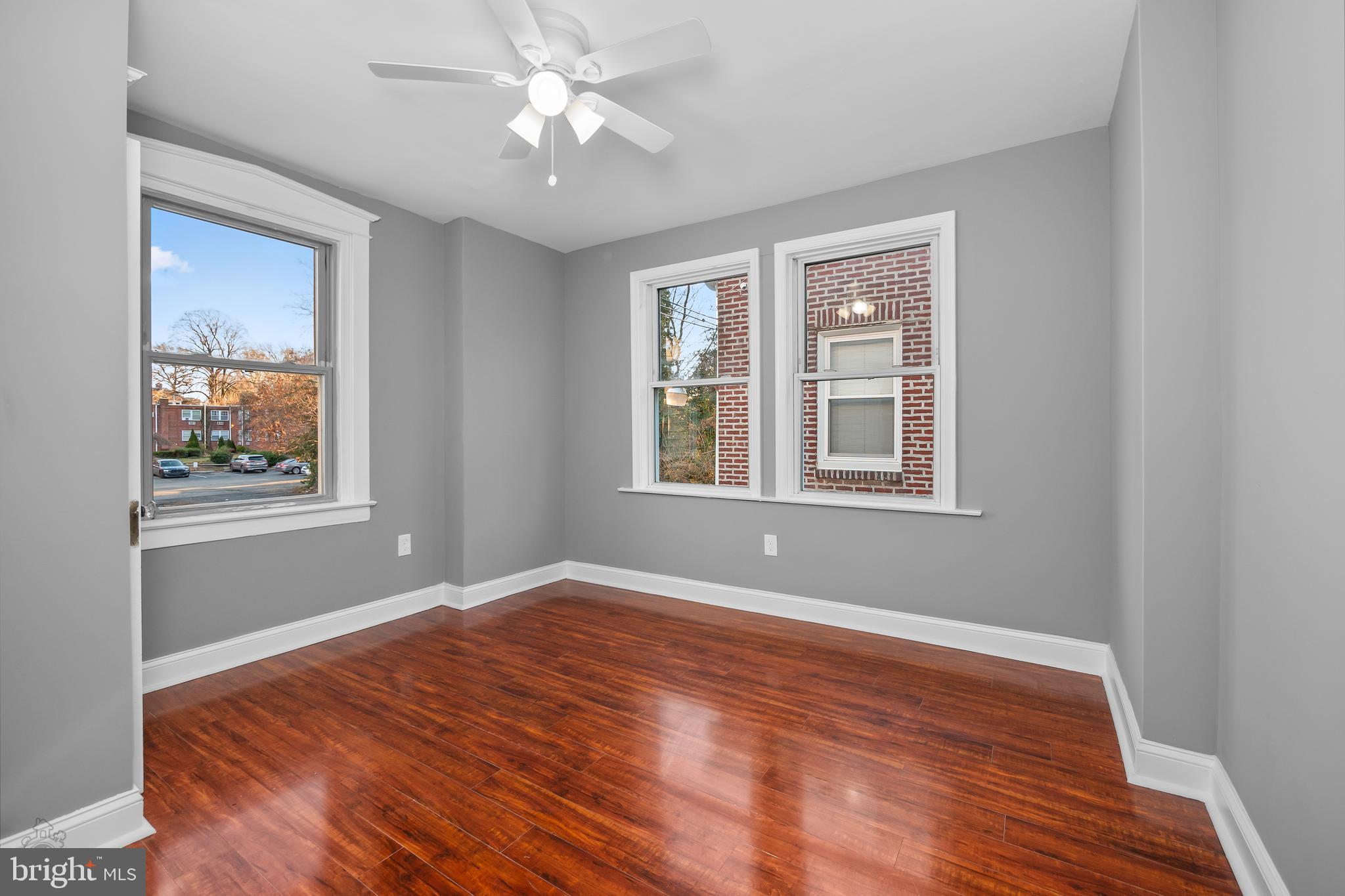 558 East Locust Avenue Philadelphia, PA 19144 - Photo 20 of 33 a view of empty room with wooden floor and fan