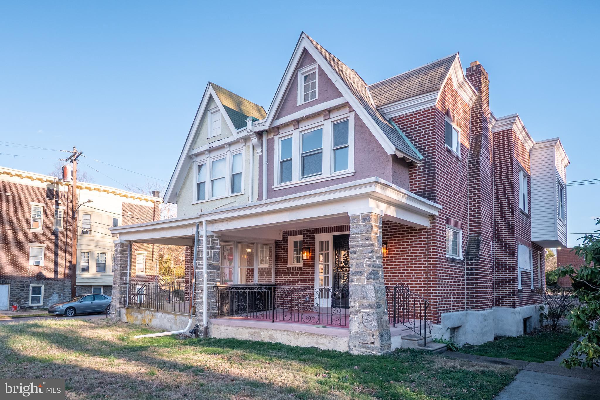 558 East Locust Avenue Philadelphia, PA 19144 - Photo 2 of 33 a front view of a house with a yard