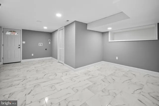 a bathroom with a sink and a shower