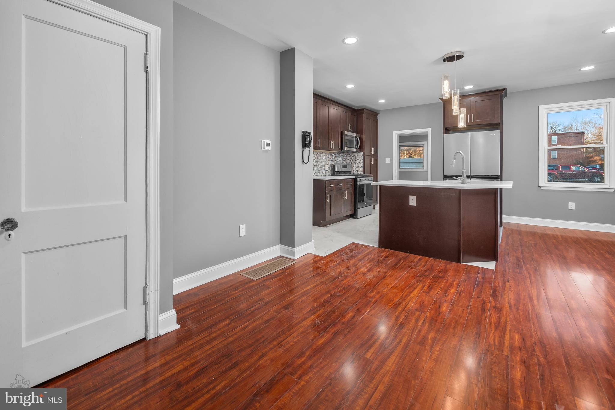 558 East Locust Avenue Philadelphia, PA 19144 - Photo 10 of 33 a view of kitchen and wooden floor