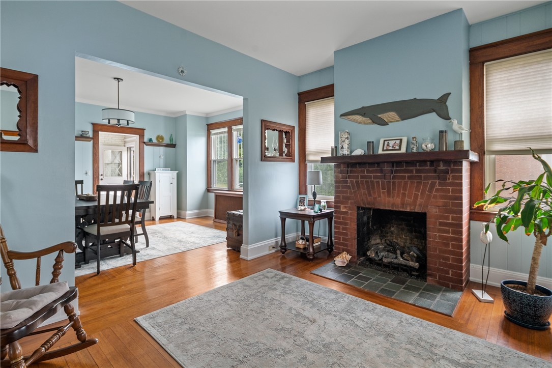 199 High Street Westerly, RI 02891 - Photo 2 of 22 The warm fireplace greets you in the entryway