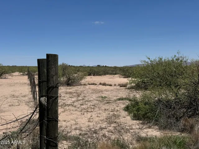 a view of a road with a yard