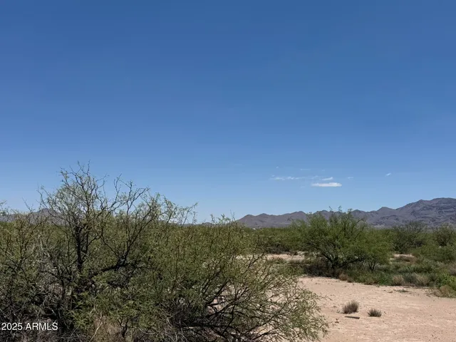 a view of lake with mountain