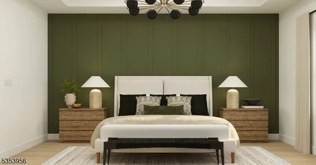 a bedroom with a bed and a night stand