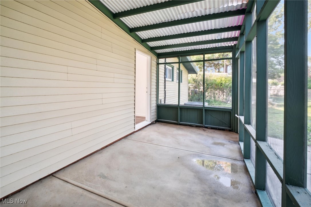 6683 Sherborn Road Cleveland, OH 44130 - Photo 37 of 42 Unfurnished sunroom with lofted ceiling with beams