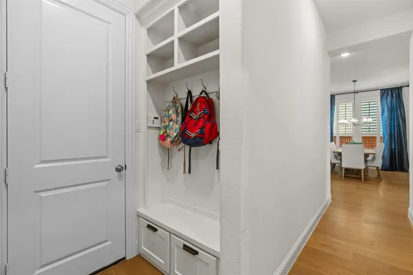 a view of entryway with wooden floor