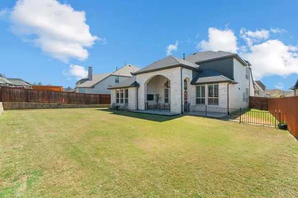 a front view of a house with swimming pool