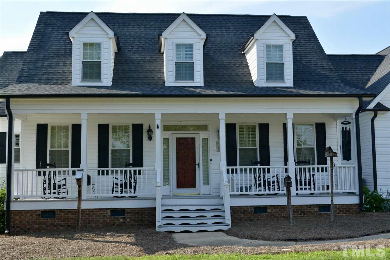 1004 Tyler Farms Drive Raleigh, NC 27603 - Photo 2 of 29 front view of a house with a porch