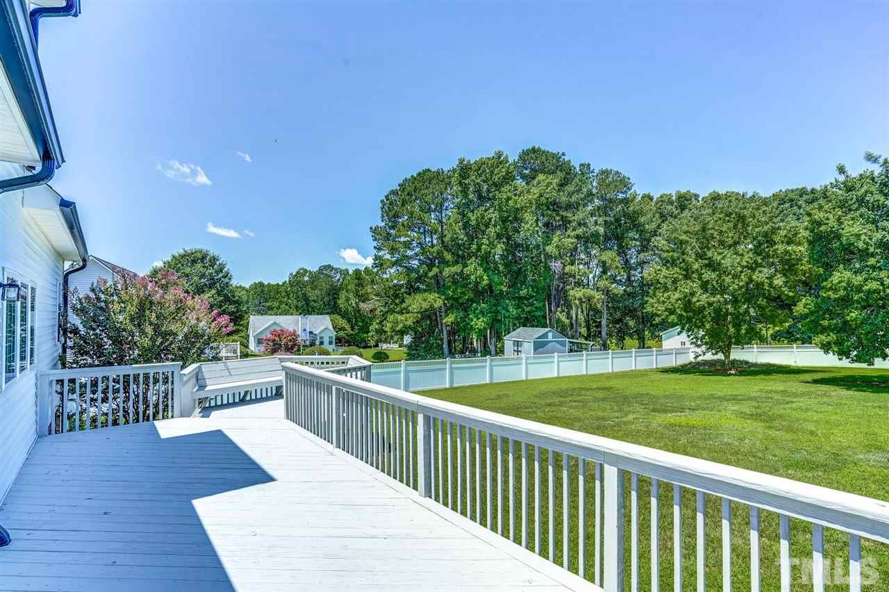 1004 Tyler Farms Drive Raleigh, NC 27603 - Photo 22 of 29 a view of a balcony with yard