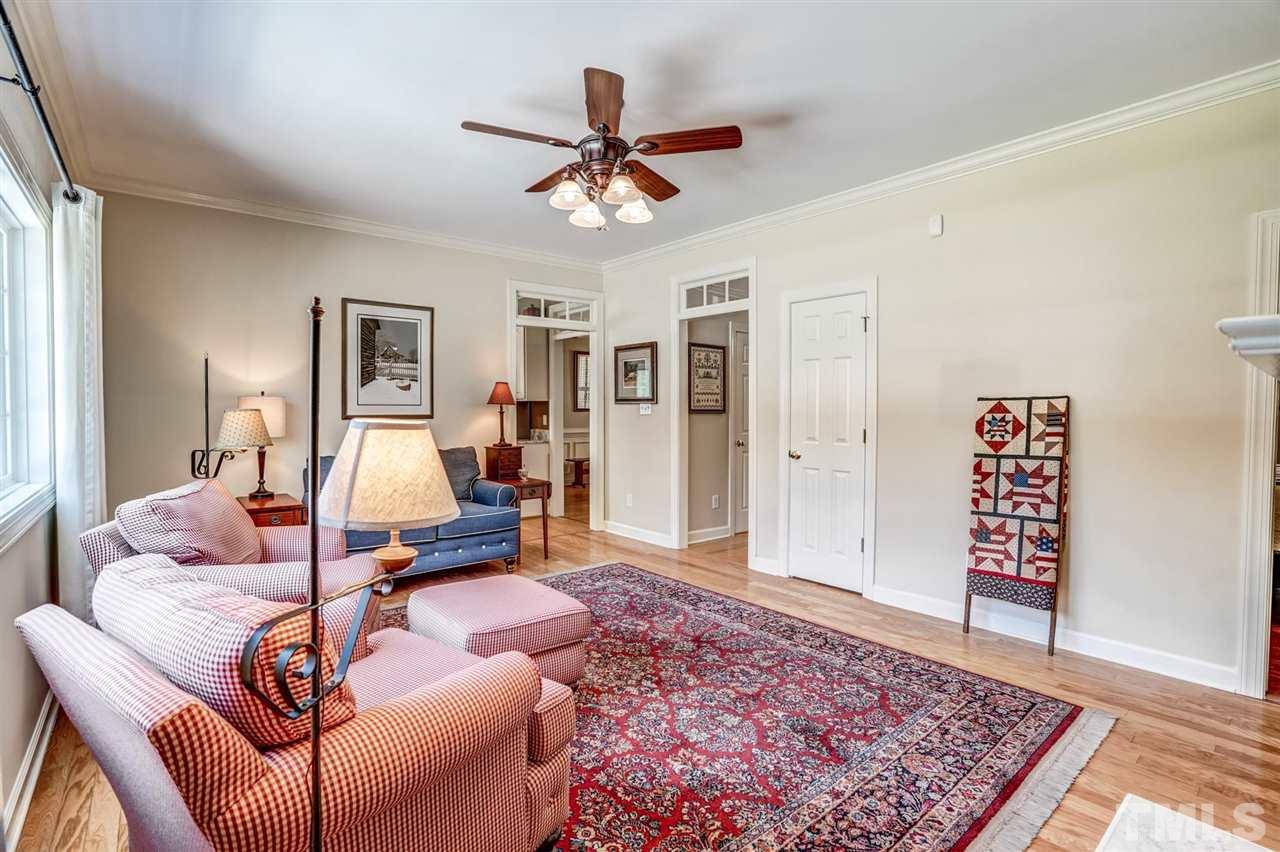 1004 Tyler Farms Drive Raleigh, NC 27603 - Photo 10 of 29 a living room with furniture and a rug