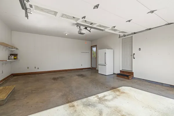 a view of a room with wooden walls