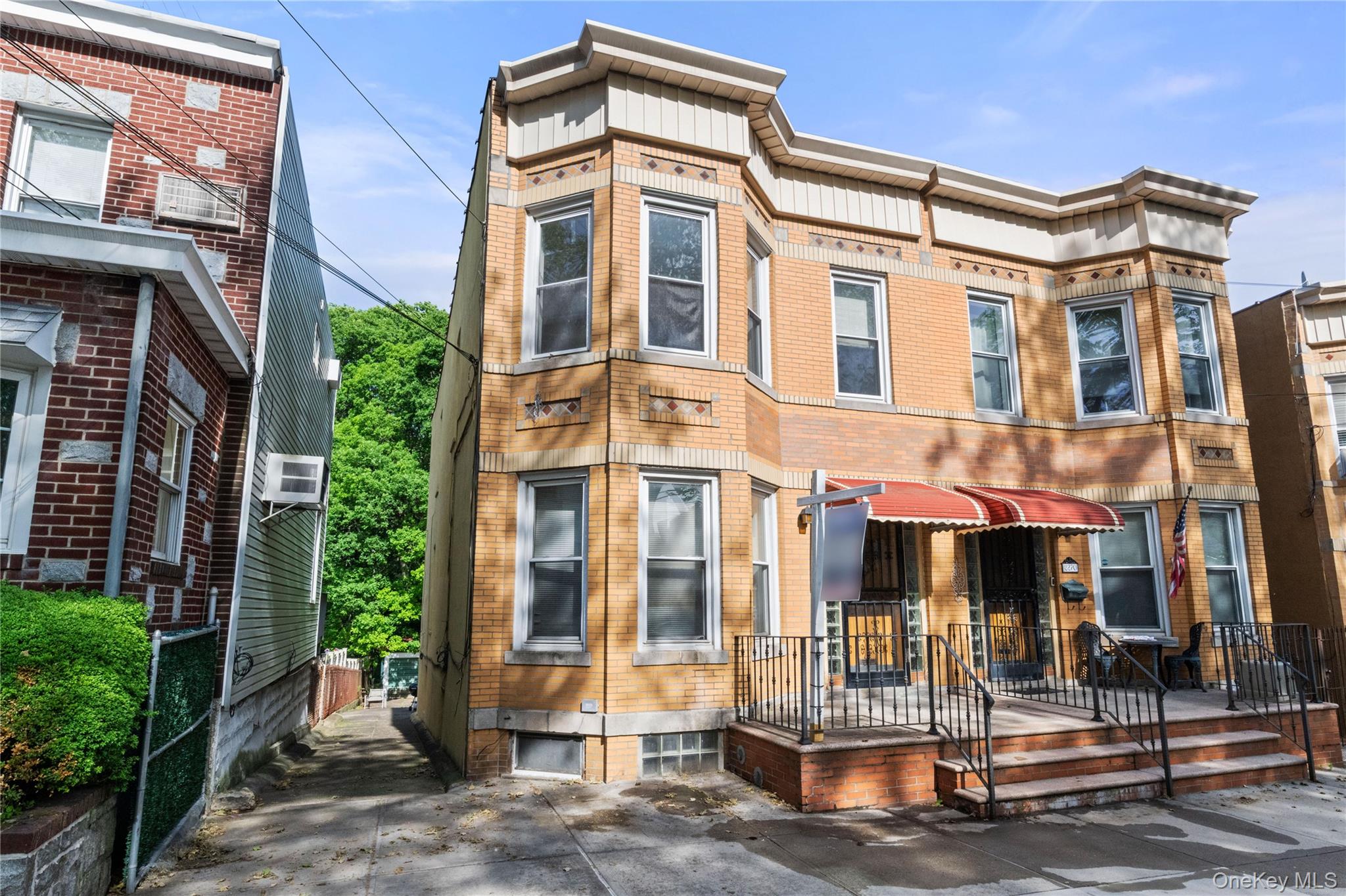 82-72 88th Place Queens, NY 11421 - Photo 1 of 26 front view of a building