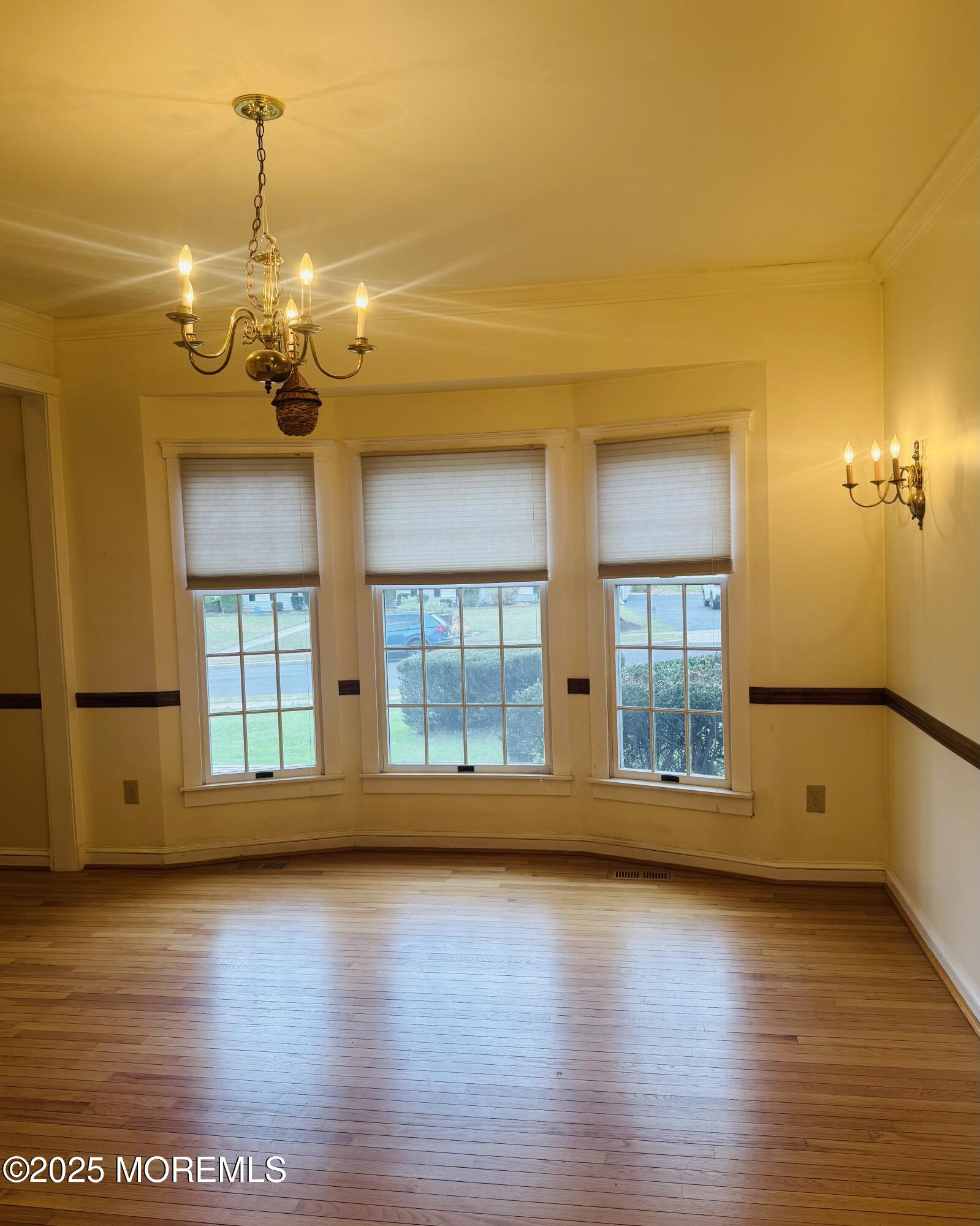 8 Ivy Lane Wrightstown, NJ 08562 - Photo 26 of 106 a view of an empty room with wooden floor and a window
