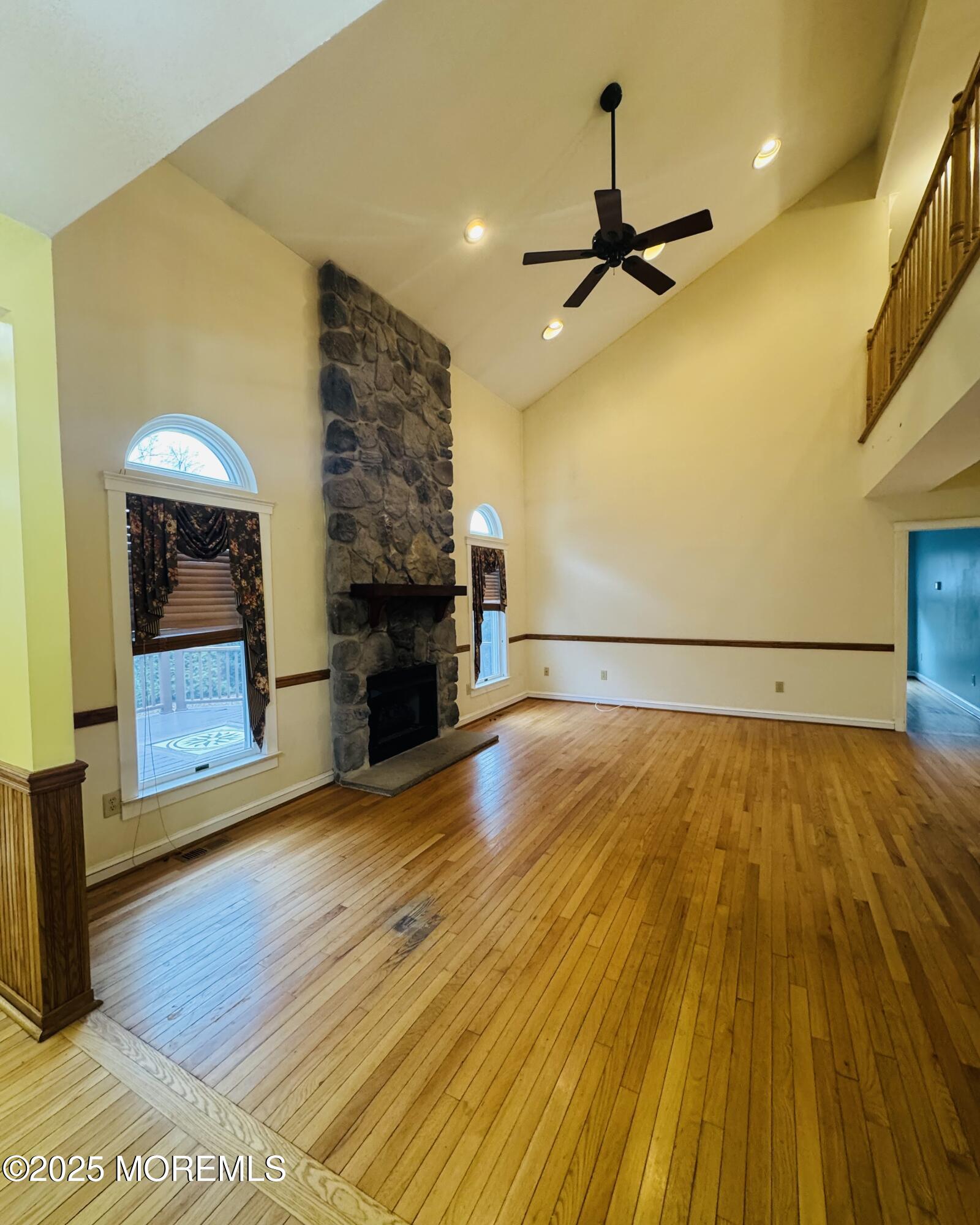 8 Ivy Lane Wrightstown, NJ 08562 - Photo 29 of 106 a view of empty room with a fireplace and wooden floor