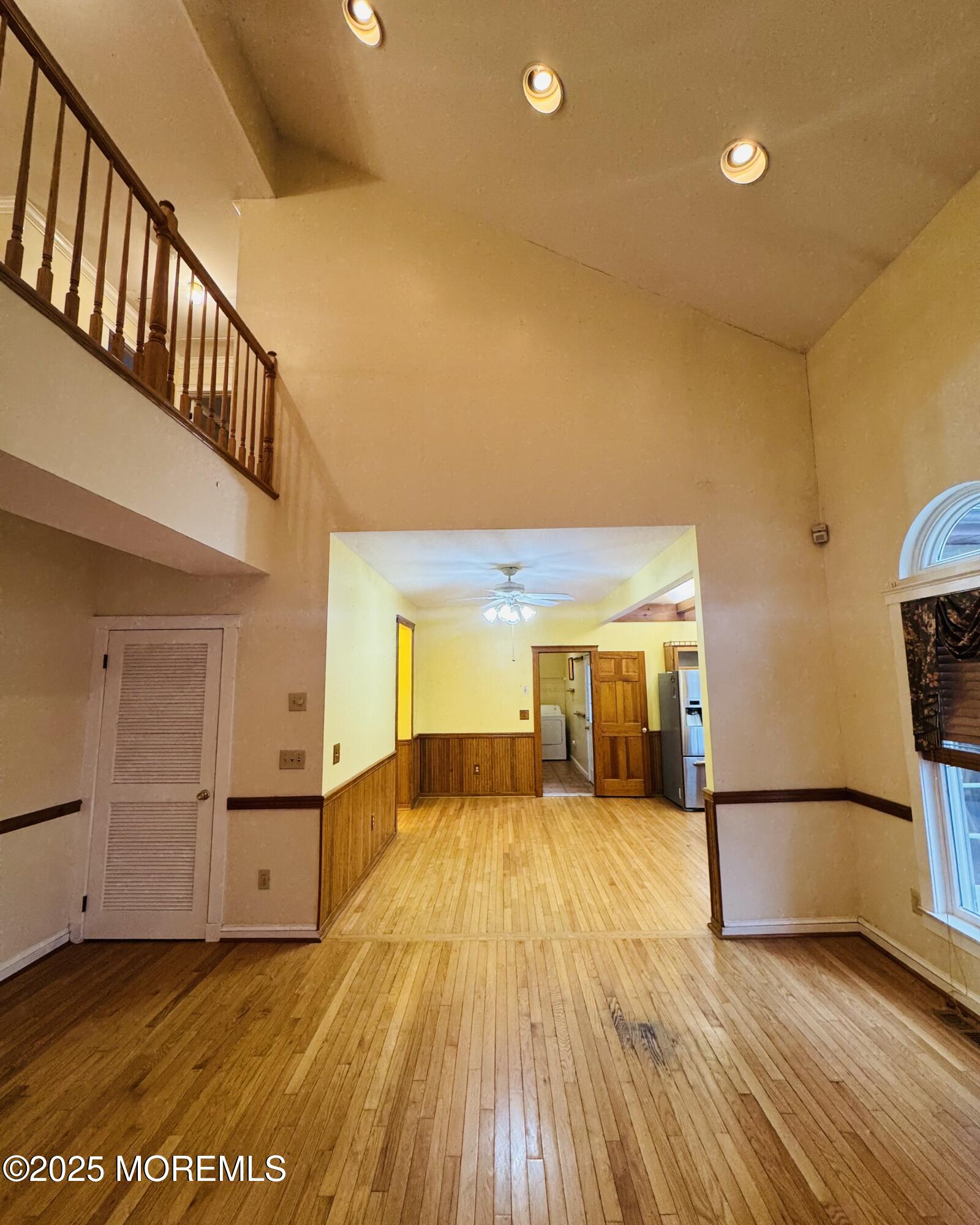 8 Ivy Lane Wrightstown, NJ 08562 - Photo 32 of 106 a view of a big room with wooden floor and windows