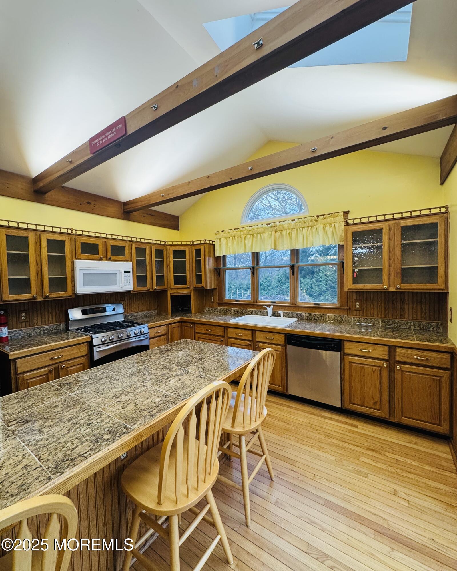 8 Ivy Lane Wrightstown, NJ 08562 - Photo 50 of 106 a kitchen with stainless steel appliances granite countertop a sink and cabinets