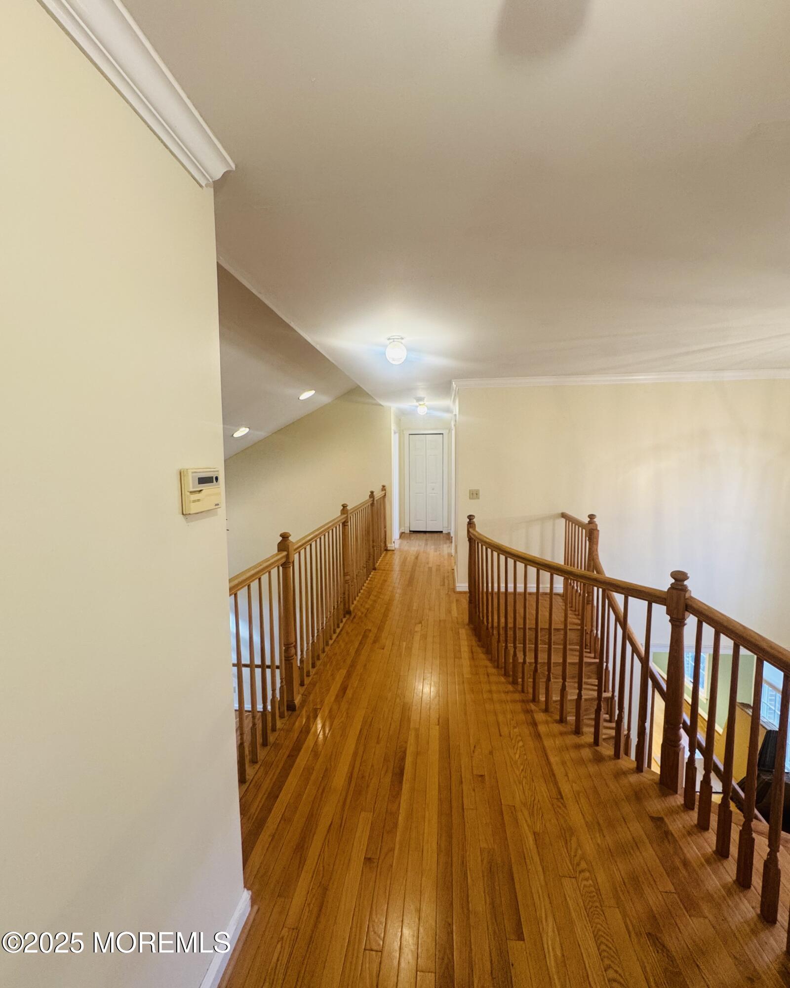 8 Ivy Lane Wrightstown, NJ 08562 - Photo 55 of 106 a view of a hallway with wooden floor