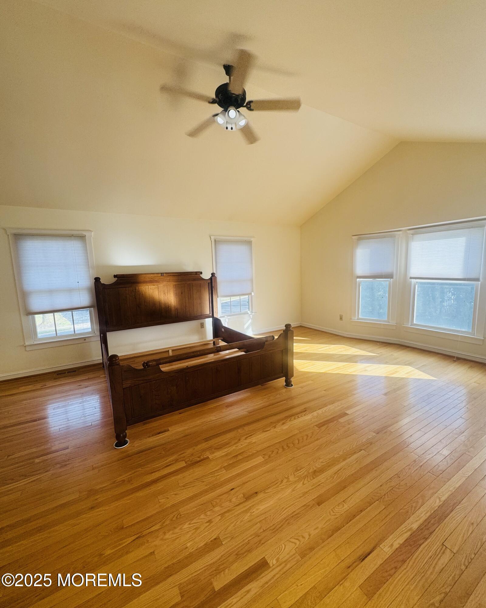 8 Ivy Lane Wrightstown, NJ 08562 - Photo 60 of 106 a living room with hardwood floor and a ceiling fan
