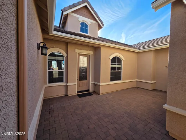 a view of room with floor to ceiling window