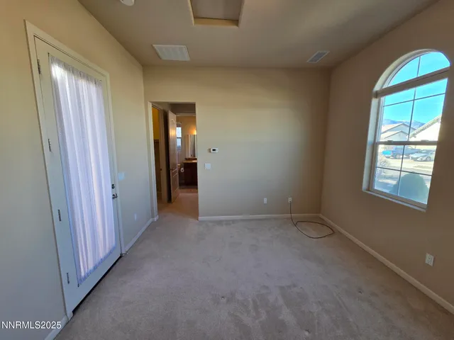 a view of bathroom with a tub and shower