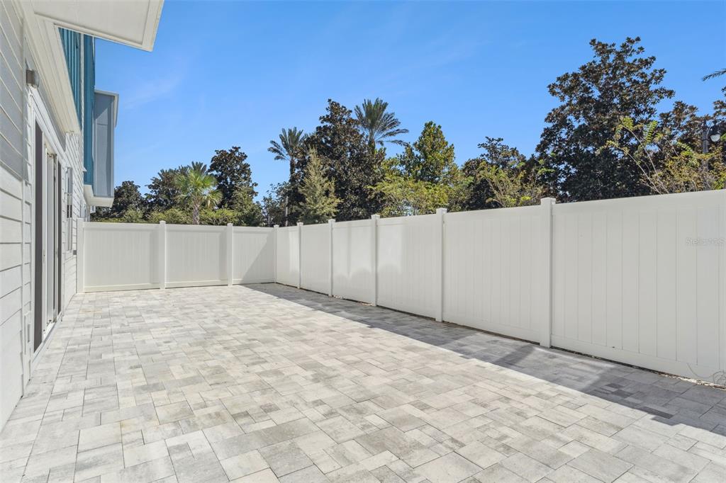 7760 Sandy Ridge Drive, Unit 112 Reunion, FL 34747 - Photo 19 of 23 a view of a backyard