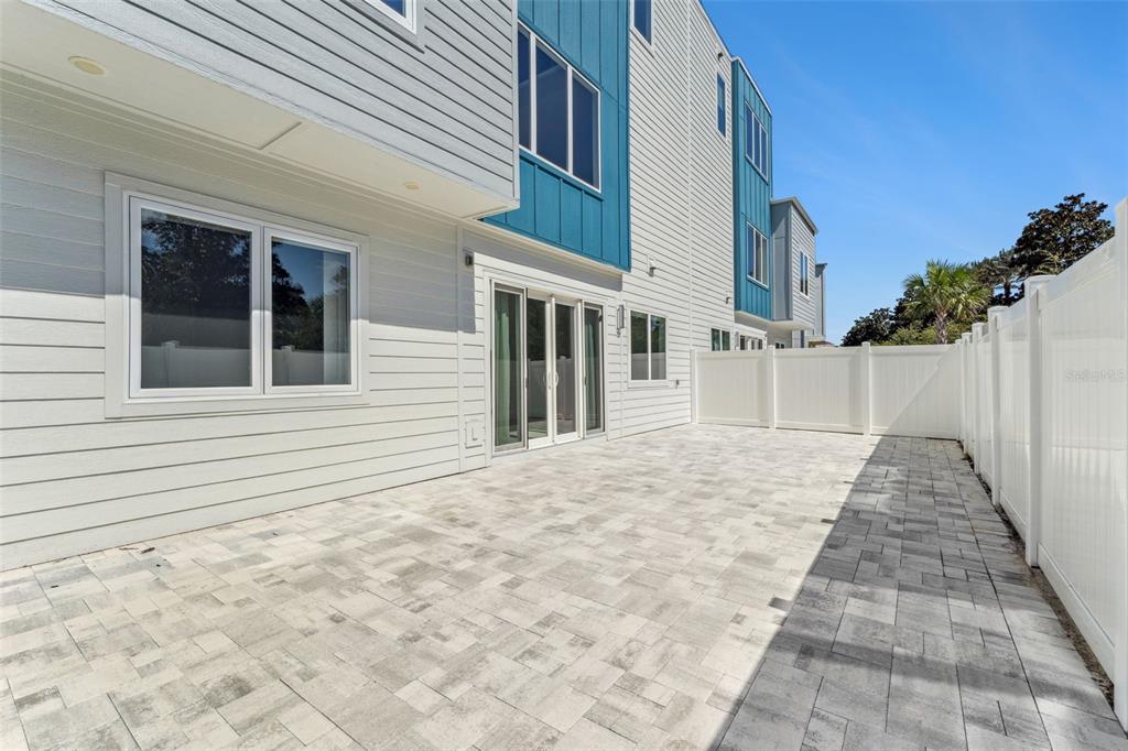 7760 Sandy Ridge Drive, Unit 112 Reunion, FL 34747 - Photo 22 of 23 a view of a brick house with many windows