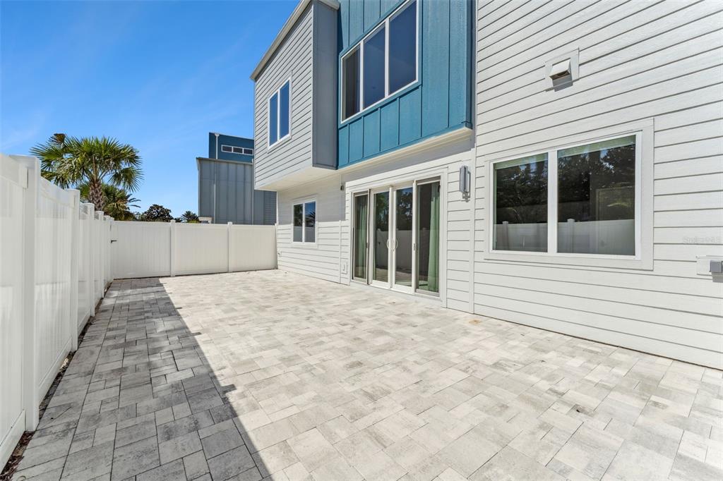 7760 Sandy Ridge Drive, Unit 112 Reunion, FL 34747 - Photo 23 of 23 a view of a white building with many windows