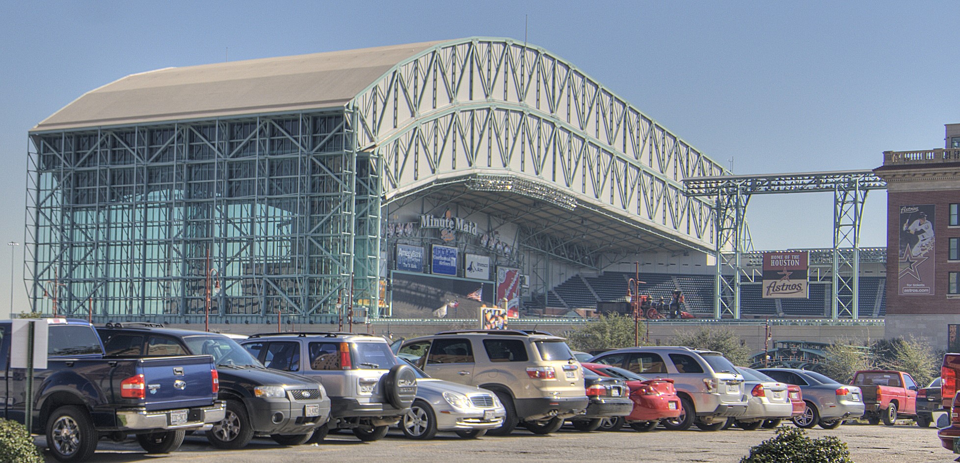 2700 Brazos Street, Unit 4424 Houston, TX 77006 - Photo 24 of 24 a front view of a building with cars parked