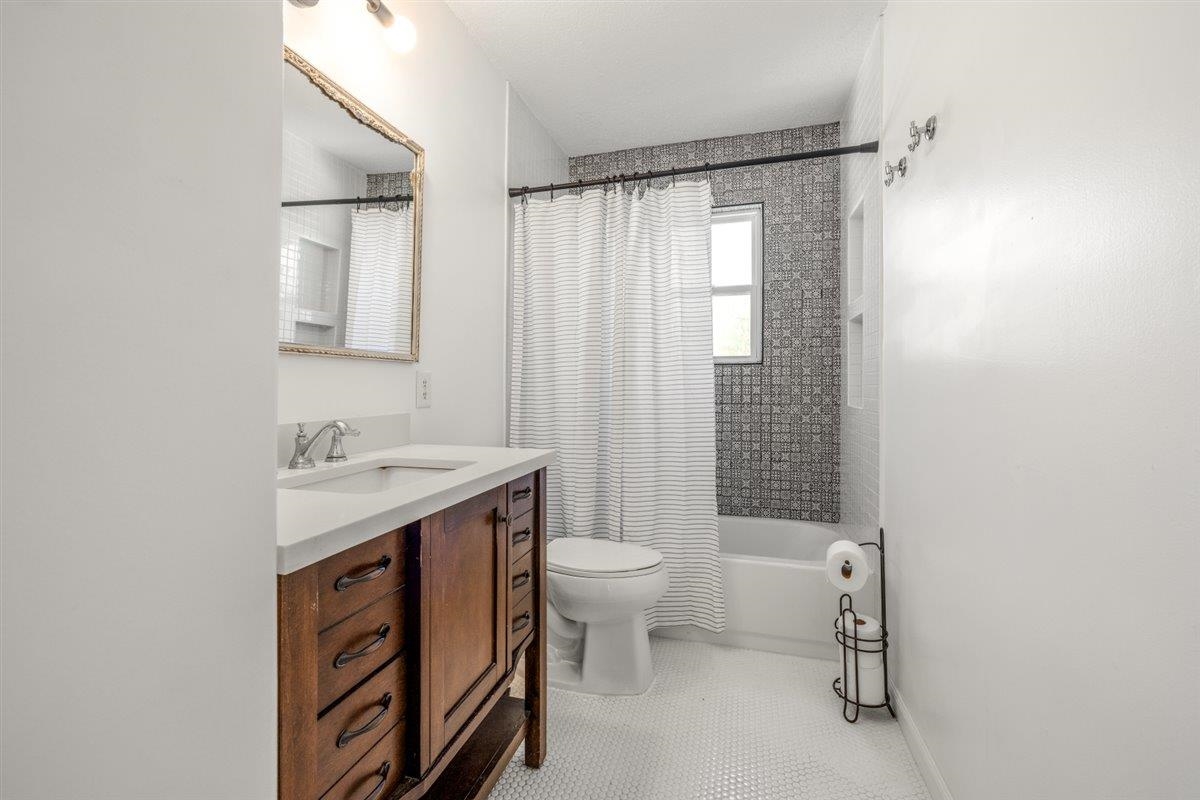 5626 Lamb Road Arlington, TN 38002 - Photo 27 of 33 a bathroom with a sink toilet and shower