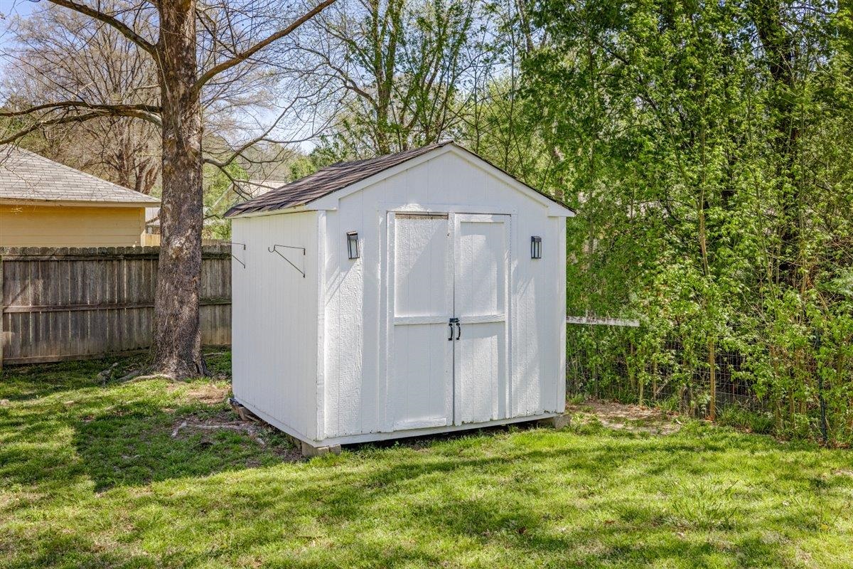 5626 Lamb Road Arlington, TN 38002 - Photo 31 of 33 a view of a small house with a yard and fence