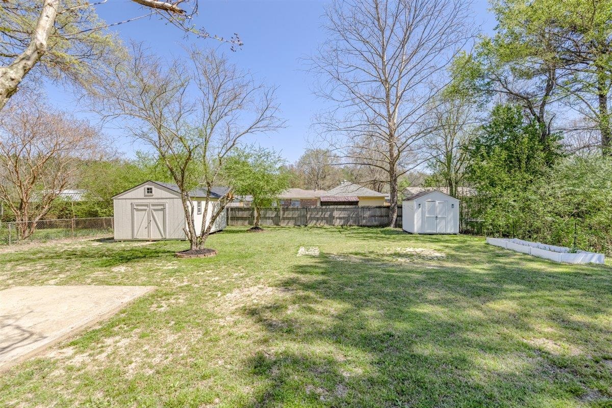5626 Lamb Road Arlington, TN 38002 - Photo 32 of 33 a house with trees in front of it