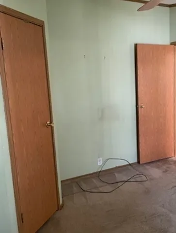 an empty room with a door