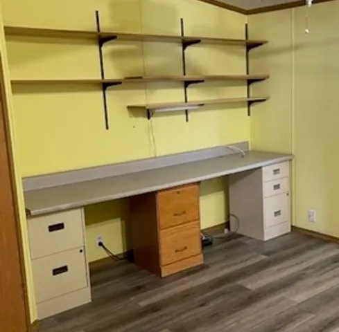 a view of a room with closet and wooden floor