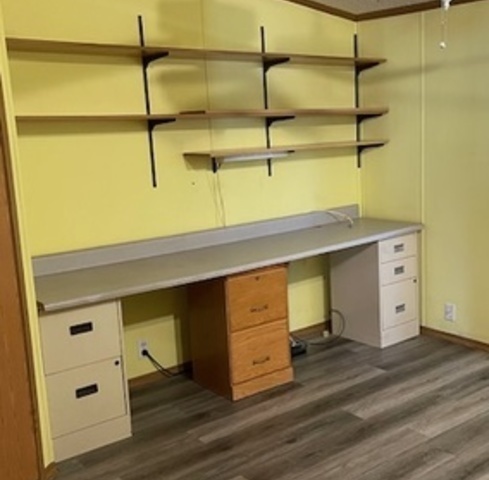 895 Cherry Street Manteno, IL 60950 - Photo 28 of 38 a view of a room with closet and wooden floor